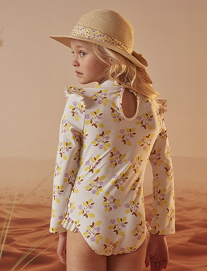 Ecru UV protection +50 bathing suit with floral print